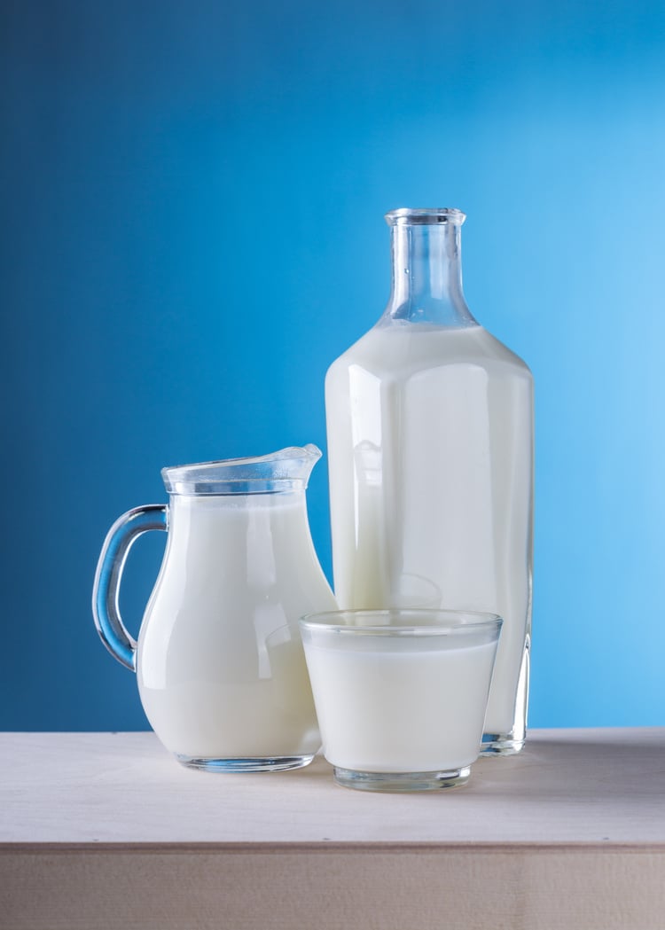 Milk on Blue Background